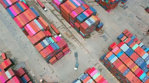 Aerial view from a drone flying over a many cargo containers Stock Footage 210788156