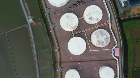 Aerial view from a drone flying over oil industrial plants Stock Footage 225384668