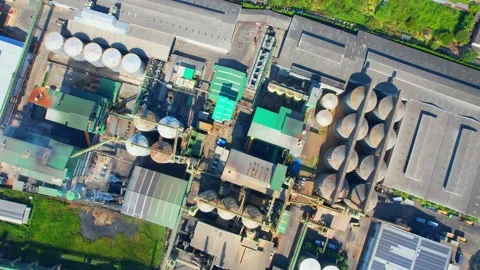 Aerial view from a drone flying over a industrial plant Stock Footage 225411501