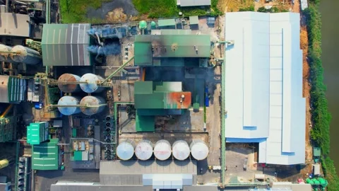 Aerial view from a drone flying over a industrial plant Stock Footage 225412088