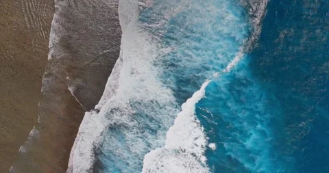 Aerial view of a drone flying over beautiful ocean waves and water. Stock Footage 248700933