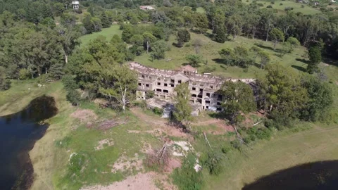 Aerial view of a drone flying over an abandoned hotel in Cordoba, Argentina Stock Footage 275205941