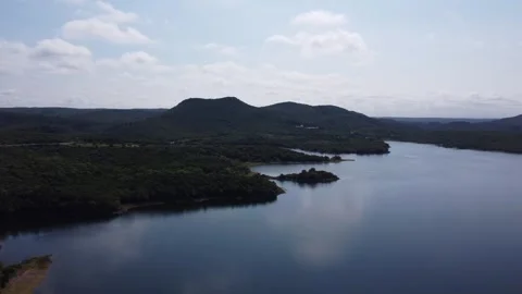 Aerial view of drone flying over a lake in Cordoba, Argentina Stock Footage 275205953