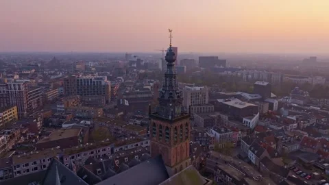 Aerial view of drone flying over Nijmegen historic center at sunset Stock Footage 306492830