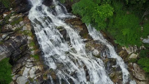 Aerial view from drone of Mae Ya Waterfalls, beautiful waterfall flowing from hi Stock Footage 170240129