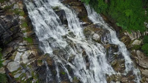 Aerial view from drone of Mae Ya Waterfalls, beautiful waterfall flowing from hi Stock Footage 191981035