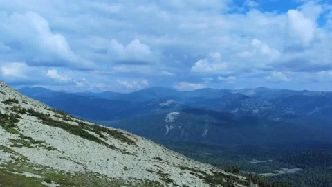 Aerial view from drone on mountain forest and peak of blue rock range. Stock Footage 141026264