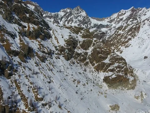 Aerial view with a drone in mountain - Winter landscape Stock Footage 73536716