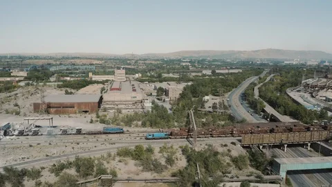 Aerial view; drone moving around production site of steel plant Video stock 112334302