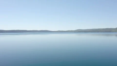Aerial view; drone moving backward to the mixed forest Stock Footage 110171364