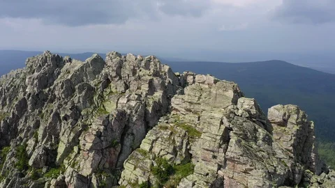 Aerial view. drone moving backward near rocky cliff Stock Footage 114162822