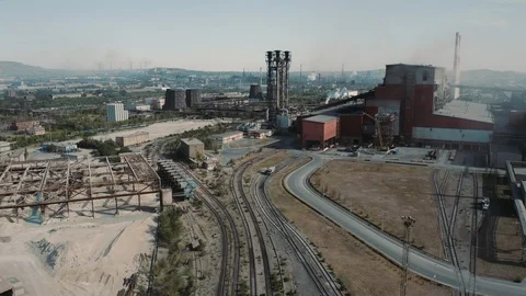 Aerial view; drone moving forward over the steel plant site Stock Footage 112334994