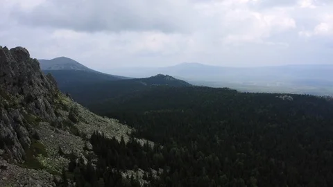 Aerial view. drone moving forward near rocky cliff Video stock 114156555