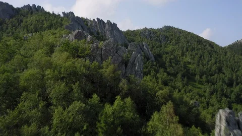 Aerial view. drone moving forward near rocky cliff Stock Footage 114158635