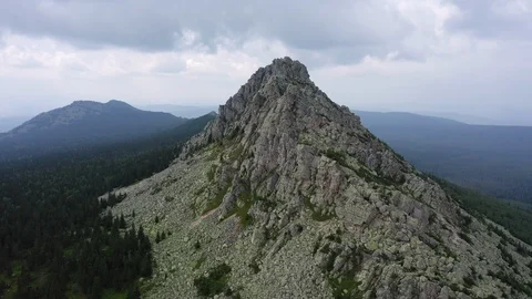 Aerial view. drone moving forward near rocky cliff Stock Footage 114160373