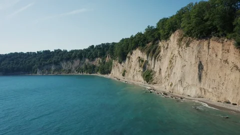 Aerial view; drone moving forward over beautiful seashore Stock Footage 123209067