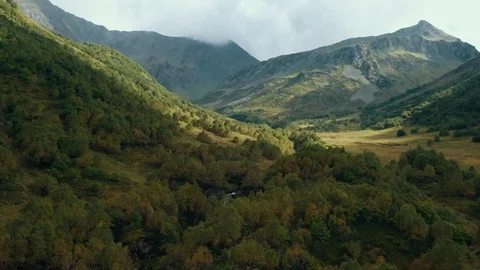 Aerial view; drone moving on mountain river valley Stock Footage 119003310