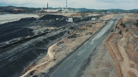 Aerial view; drone moving over the industrial site with polluted area Video stock 112782569