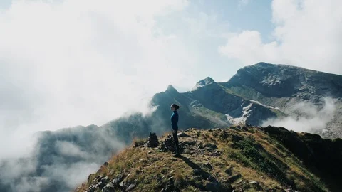 Aerial view; drone moving over young woman Stock Footage 117410729