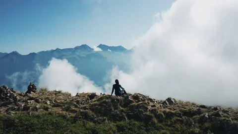 Aerial view; drone moving over young woman Stock Footage 117414629