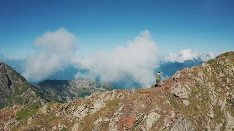 Aerial view; drone moving over young man Stock Footage 117419693