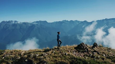 Aerial view; drone moving over young woman Stock Footage 117420367