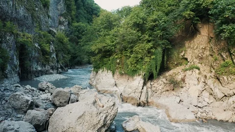 Aerial view; drone moving over mountain river Stock Footage 118300454
