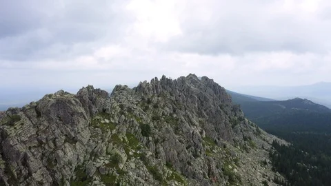 Aerial view. drone moving sideways along rocky cliff Video stock 114158763