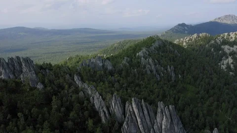 Aerial view. drone moving sideways along rocky cliff Video stock 114162413