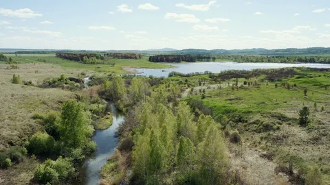 Aerial view; drone moving toward water reservuor Stock Footage 109331392