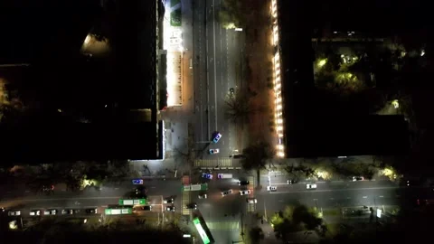 Aerial view from a drone at a night intersection Stock Footage 226092491