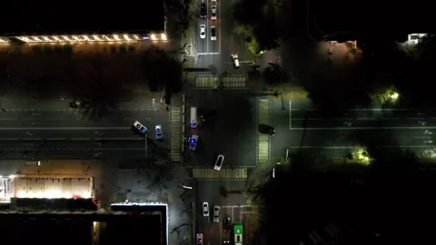 Aerial view from a drone at a night intersection Video stock 256282545