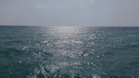 Aerial view from a drone of ocean waves in open water. Slow-motion footage .. Video stock 280257412