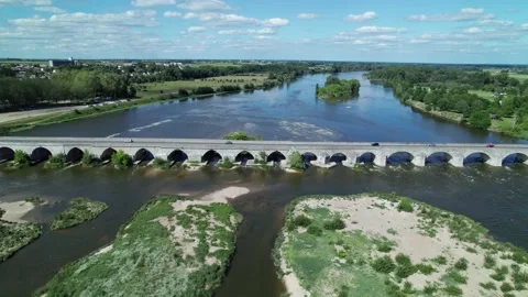 Aerial view by drone of old bridge crossing the river to the view of old city Stockbeeldmateriaal 166310856