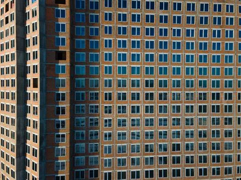Aerial view from a drone to a pattern from the windows of an unfinished building Fotos de archivo