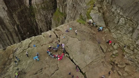 Aerial view from drone on people making heart on cliff. Stock Footage 88921071