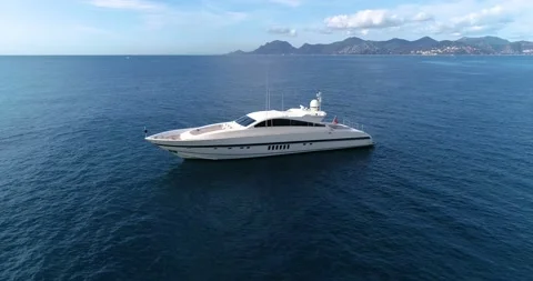 Aerial view with a drone with a RED Camera 4K of a motorboat in Monaco's coast i Stock Footage 150175927