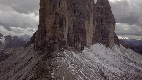 Aerial view of drone rising over Tre Cime di Lavaredo in Dolomites Stock Footage 80146906