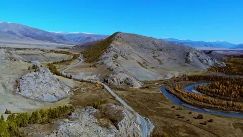 Aerial view of the drone on the road, forest, mountains river. Altay. Russia Video stock 140253089