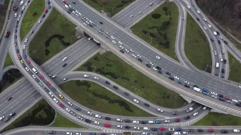 Aerial view from a drone to a road junction in the city Stock Footage 153070686