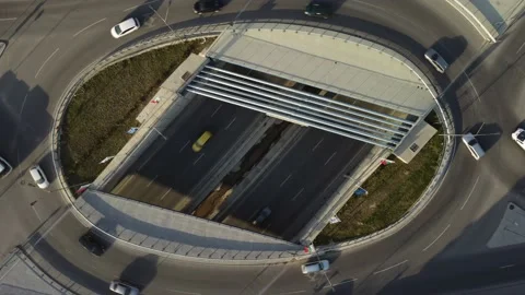 Aerial view from a drone to a road junction in the city Stock Footage 181950438