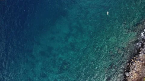 Aerial view drone rotate above clear blu ocean water in tropical paradise Stock Footage 145787464