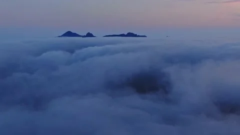 Aerial view. Drone Shooting Which Is Located Above The Cloud Layer. Dense Clouds Stock Footage 148072885