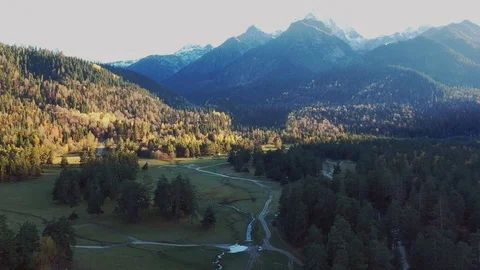 Aerial View. Drone shot over a beautiful mountain forest valley Stock Footage 129742437