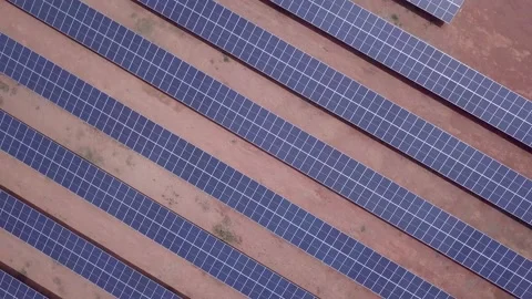 Aerial view drone of solar panels rotating on sunny summer day. Clean energy. 4K Stock Footage 147339036