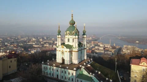 Aerial view from a drone of St. Andrew's Church in Kiev in autumn at sunset Stock Footage 165296038