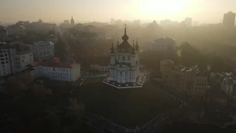 Aerial view from a drone of St. Andrew's Church in Kiev in autumn at sunset Stock Footage 165296587