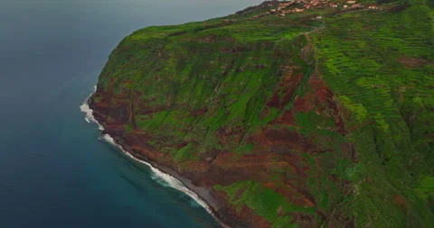 Aerial view by drone steep cliffs over the Atlantic ocean, where land meets 库存影片 268457882