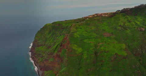 Aerial view by drone steep cliffs over the Atlantic ocean, where land meets Video stock 269709960