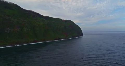 Aerial view by drone steep cliffs over the Atlantic ocean, where land meets Stockbeeldmateriaal 270362264